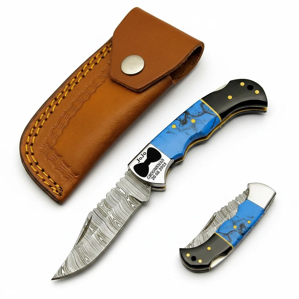 Trailblazer Hunter pocket knife with turquoise and buffalo horn handle beside its leather sheath