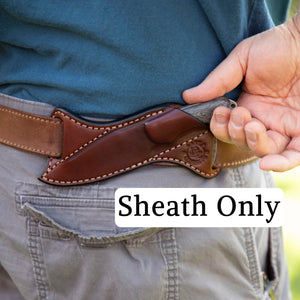 A close-up of a person wearing a brown leather knife sheath over a tan belt, with a hand holding the knife handle. A white text box reads 'Sheath Only'.